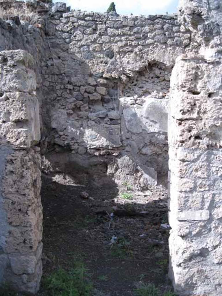 I.2.22 Pompeii. September 2010. Doorway to room 4, triclinium, in north wall of shop. Photo courtesy of Drew Baker. This is the room that Warscher described as a “cubiculum”.