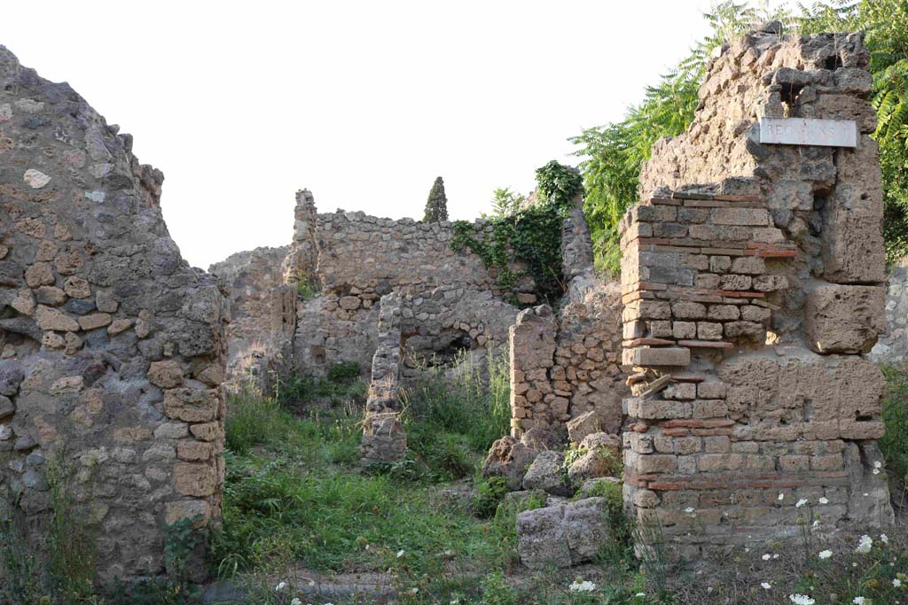 I.2.23 Pompeii. September 2018. 
Looking north to entrance doorway, from across Vicolo del Conciapelle. Photo courtesy of Aude Durand.