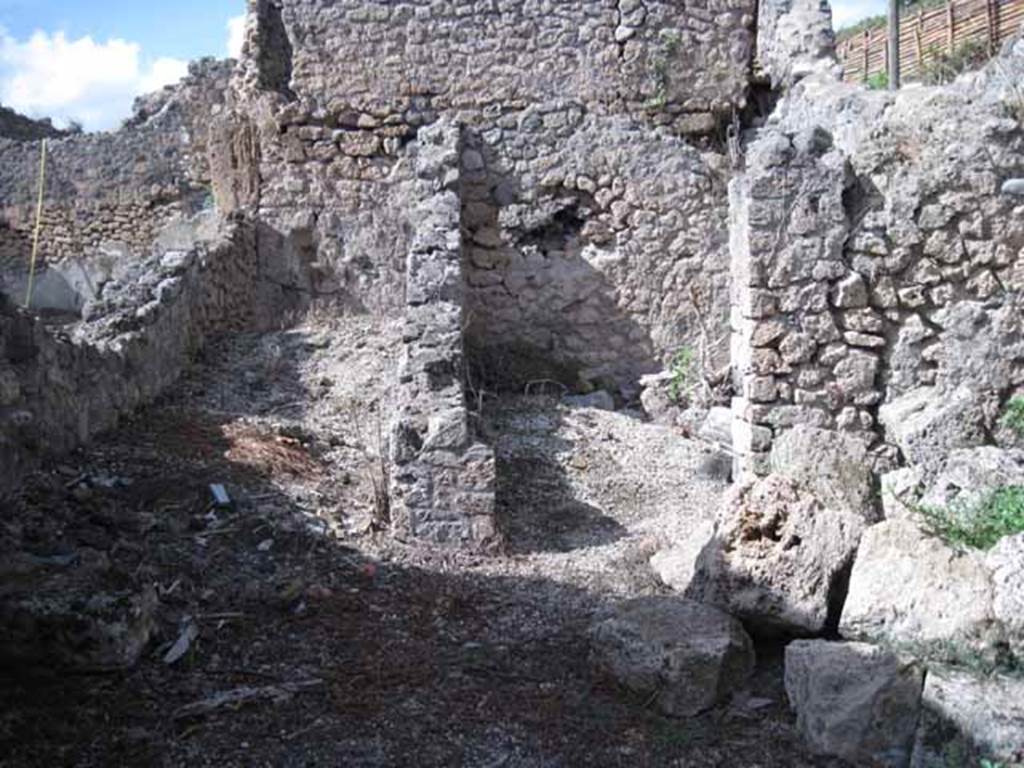 I.2.23 Pompeii. September 2010. Looking north from entrance doorway towards corridor, on left, and small room, on right. Photo courtesy of Drew Baker.