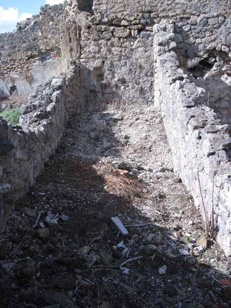 I.2.23 Pompeii. September 2010. Looking north into corridor, leading to kitchen area. Photo courtesy of Drew Baker.