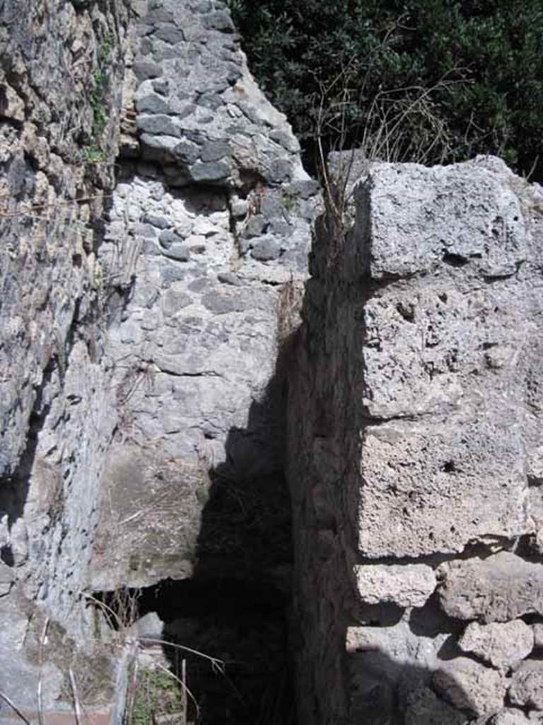 I.2.23 Pompeii. September 2010. 
Looking east in kitchen/latrine at end of corridor, at the rear of the small room. Photo courtesy of Drew Baker.