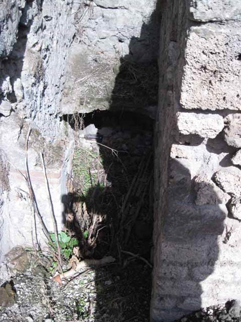 I.2.23 Pompeii. September 2010. 
Looking east, detail of lower part of kitchen/latrine. Photo courtesy of Drew Baker.
