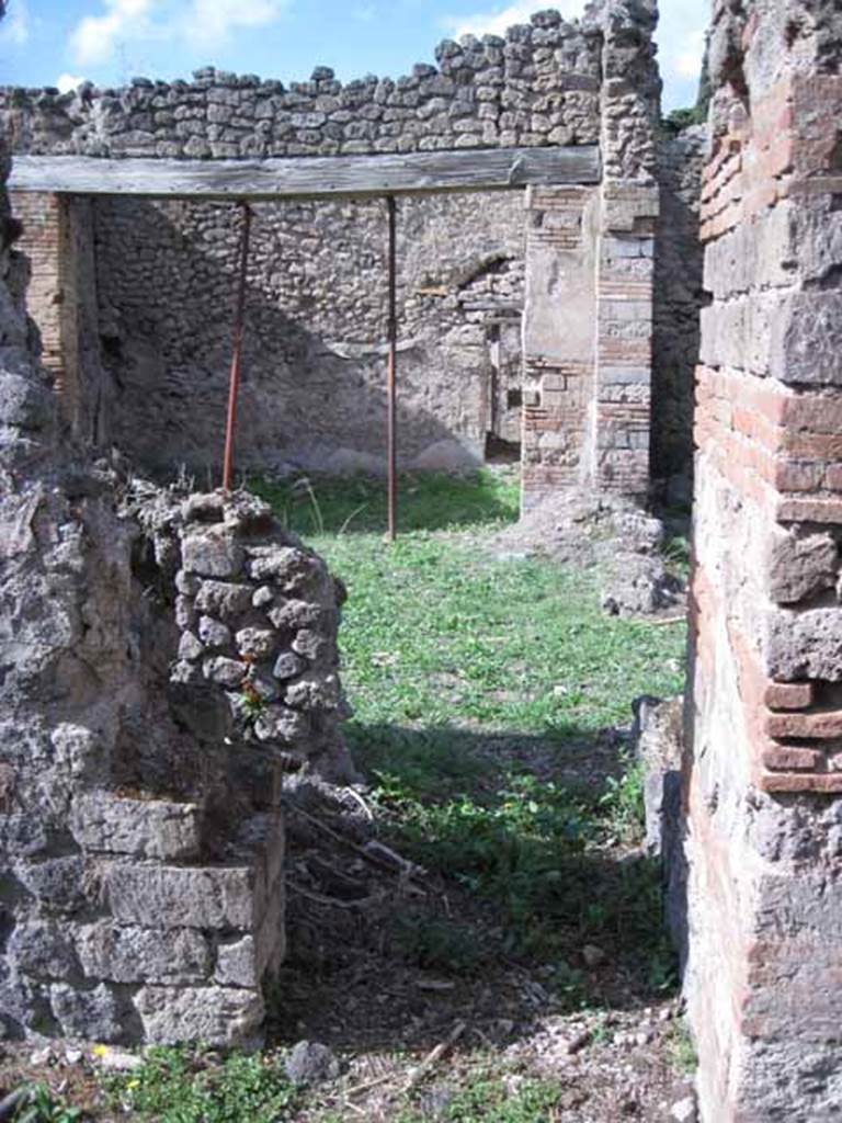 I.2.24 Pompeii. September 2010. Looking north through doorway of large room, into atrium. Photo courtesy of Drew Baker.