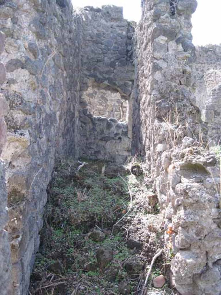 I.2.24 Pompeii. September 2010.  Looking west towards stairs between the doorway to the large room, on left, and atrium, on right. Photo courtesy of Drew Baker.
