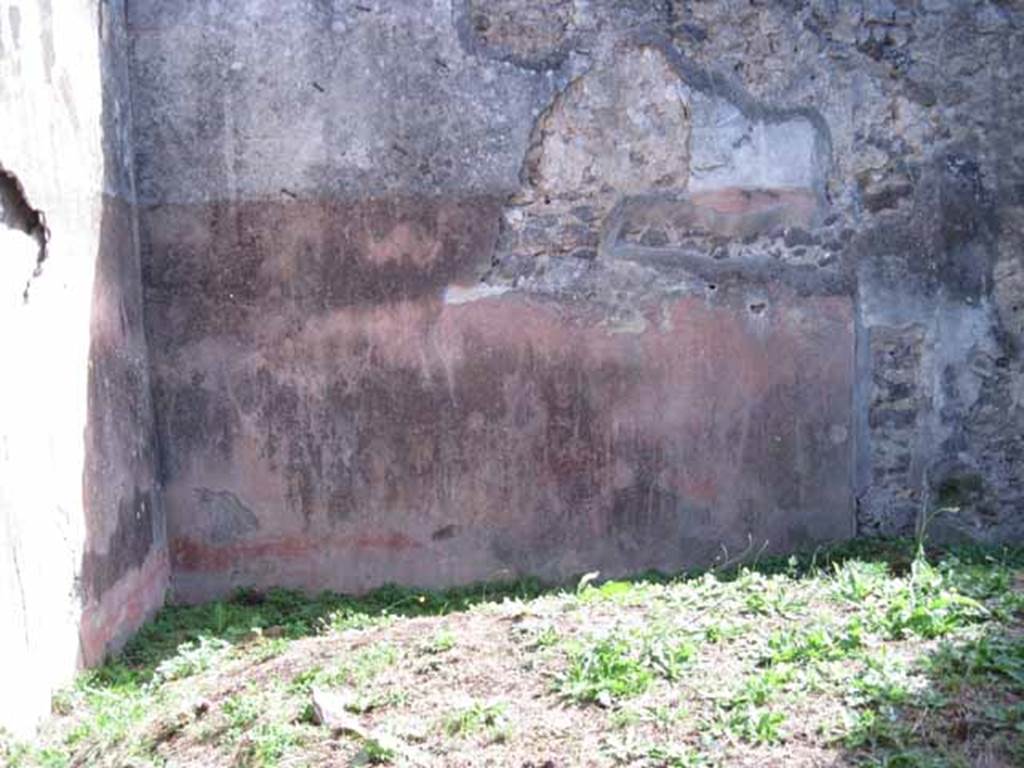 I.2.28 Pompeii. September 2010. South wall, of room on east side of corridor. 
The doorway to the corridor would have been in the west wall, on the right. Photo courtesy of Drew Baker.