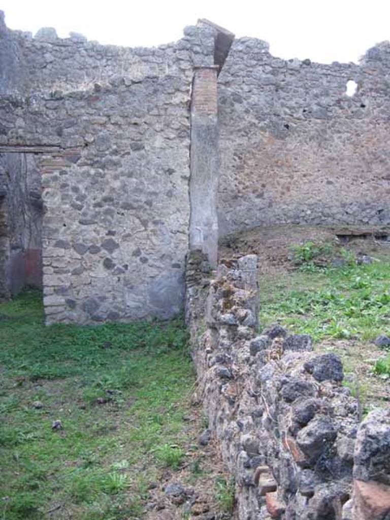 I.2.28 Pompeii. September 2010. Looking west along south portico garden wall. Photo courtesy of Drew Baker.  According to Jashemski, this originally would have been the site of an entrance through the wall into the garden.