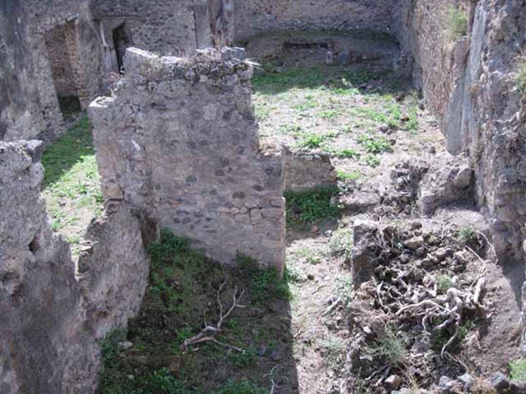 I.2.20 Pompeii. September 2010. Looking west into kitchen area below I.2.20, and across towards garden. In the lower right can be seen, the site of the first small room on the north side of the kitchen. On the west side of the room can be seen the remains of the steps to the upper floor. In the centre right, in the peristyle wall, can be seen another entrance into the peristyle garden. Photo courtesy of Drew Baker.