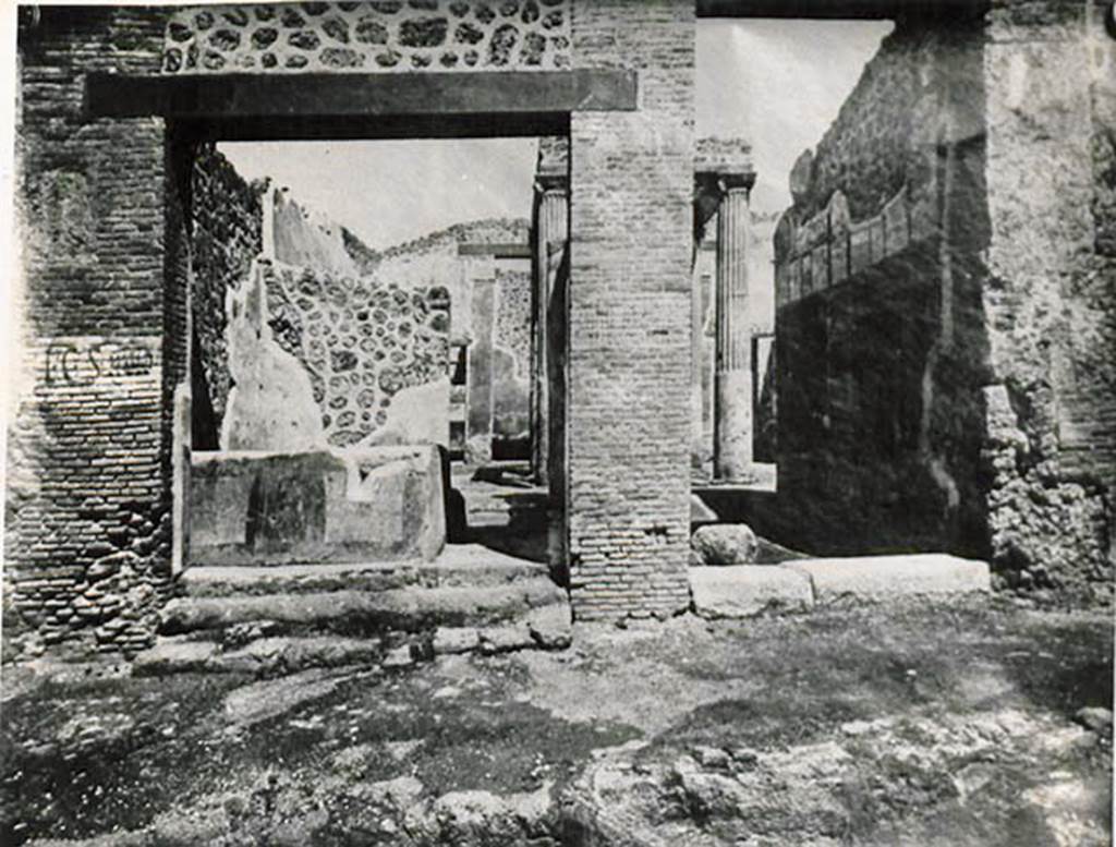 I.2.29 Pompeii. Riproduzione di un vecchia fotografia. Looking north to entrance doorways, 1.2.29 on the left, I.2.28 on the right. 
See Warscher T., 1935. Codex Topographicus Pompeianus: Regio I.2. (no.48), Rome: DAIR, whose copyright it remains.