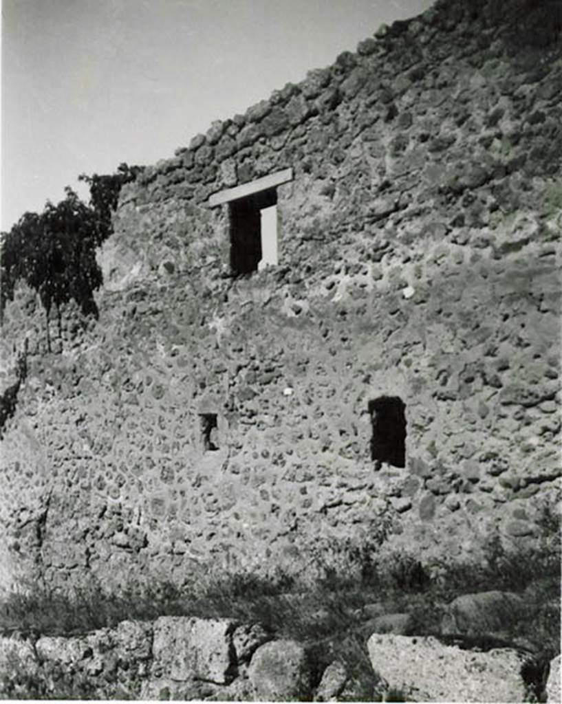 I.2.30 Pompeii. 1935 photo taken by Tatiana Warscher. Looking towards wall with windows positioned between I.2.30, on the left, and I.2.29, on the right. 
See Warscher T., 1935. Codex Topographicus Pompeianus: Regio I.2. (no.64), Rome: DAIR, whose copyright it remains.