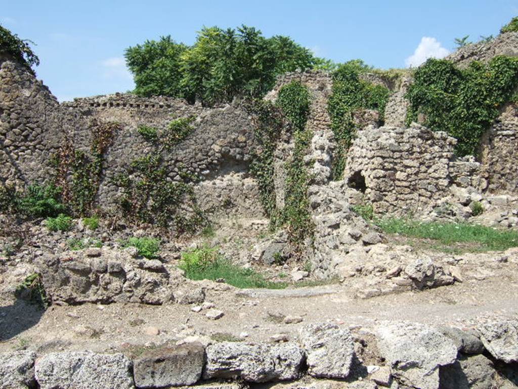 I.2.30 Pompeii. September 2005. Looking north towards remains of walls and cill of doorway. On the west side (left) of the doorway was a latrine, totally destroyed in 1943. See Van der Poel, H. B., 1986. Corpus Topographicum Pompeianum, Part IIIA. Austin: University of Texas. (p.4)