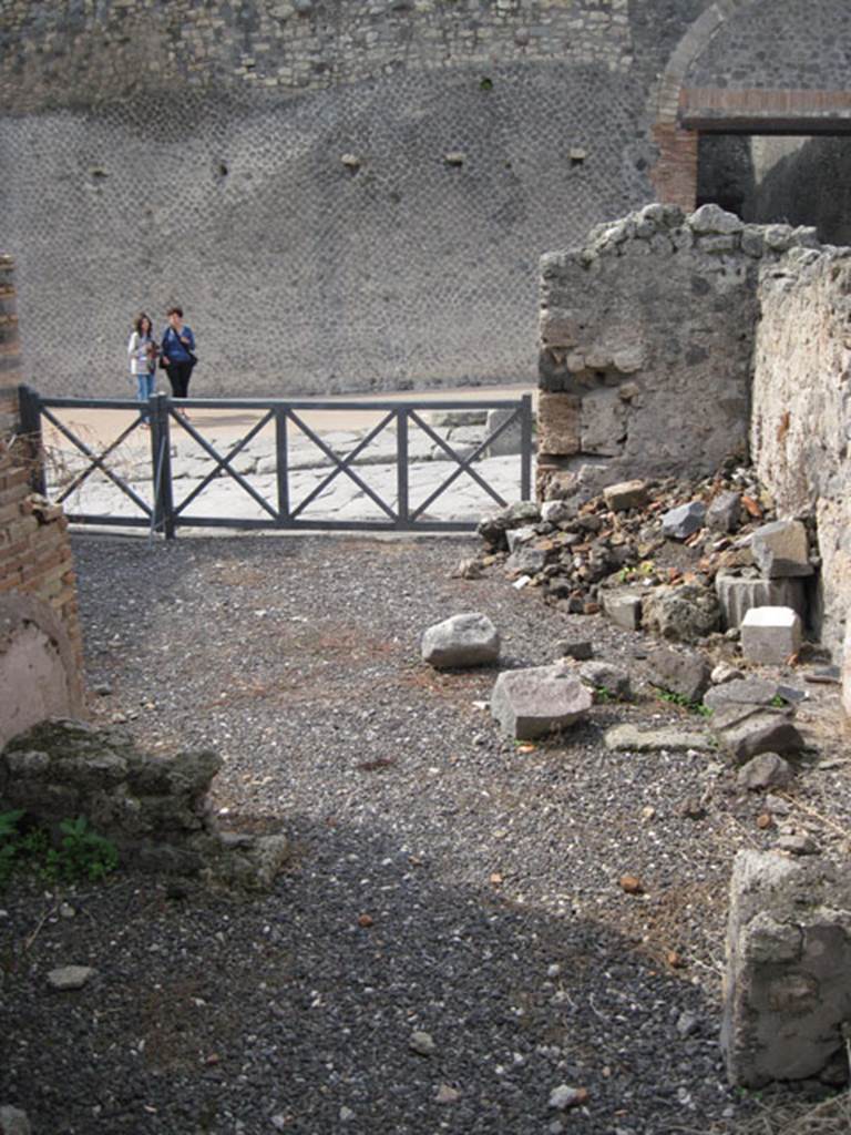 I.3.1 Pompeii. September 2010. Looking west across bakery room towards Via Stabiana from oven room. Photo courtesy of Drew Baker.