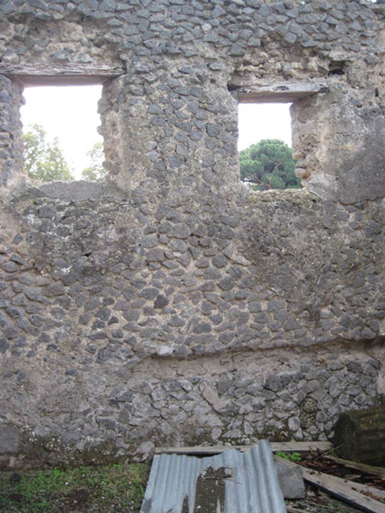 I.3.1 Pompeii. September 2010. South wall of rear room with windows overlooking small unnamed vicolo.  Photo courtesy of Drew Baker.