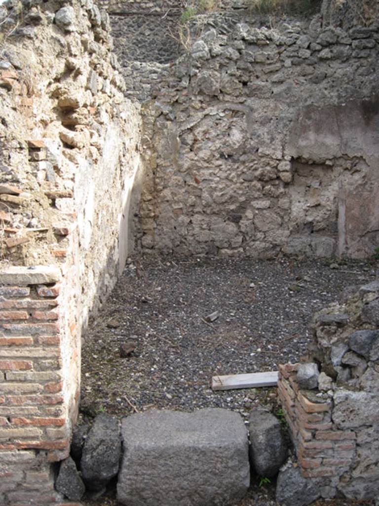 I.3.1 Pompeii. September 2010. Entrance doorway to small room in south-east corner, looking east. Photo courtesy of Drew Baker.