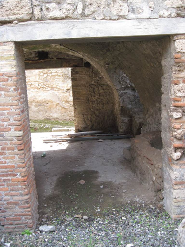 I.3.3 Pompeii. September 2010. Looking south through the west doorway into the kitchen area. Photo courtesy of Drew Baker.