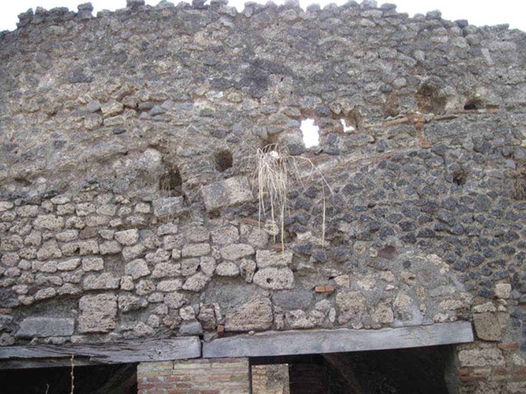 I.3.3 Pompeii. September 2010. South wall above the two kitchen doorways. Photo courtesy of Drew Baker.