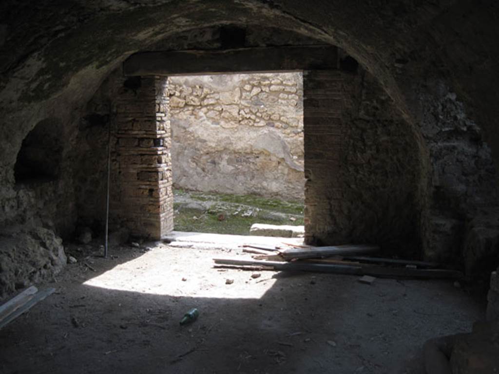 I.3.3 Pompeii. September 2010. Looking south across kitchen area towards entrance doorway at I.3.3, and unnamed vicolo. Photo courtesy of Drew Baker.