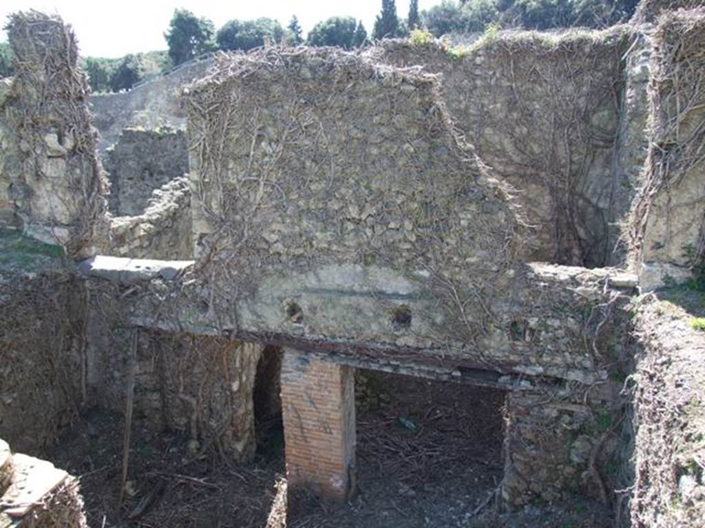 1.3.3 Pompeii.  March 2009. West Portico area, and doorway to top of staircase, on upper left.  On the upper right is a doorway to room in north-west corner of peristyle which, according to Mau, was ruined when excavated. This room would have been above the yard room in the subterranean level. See Mau, A: BdI, 1874 (p.183)