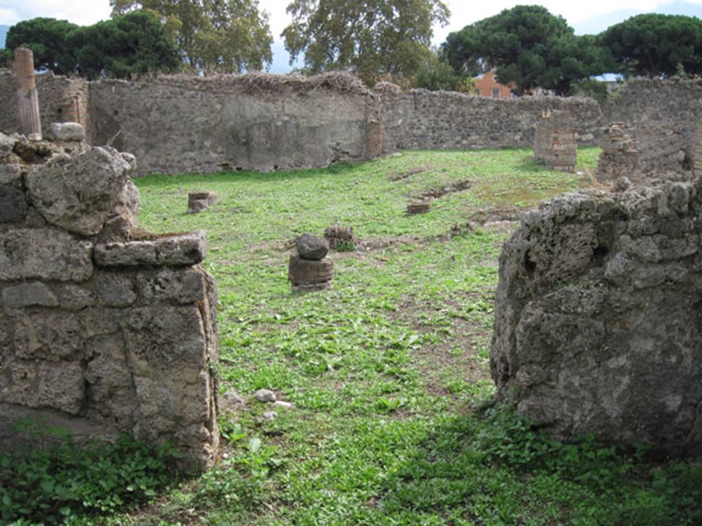 I.3.3 Pompeii. September 2010. Upper peristyle area, looking south through doorway from oecus onto peristyle.  Photo courtesy of Drew Baker.