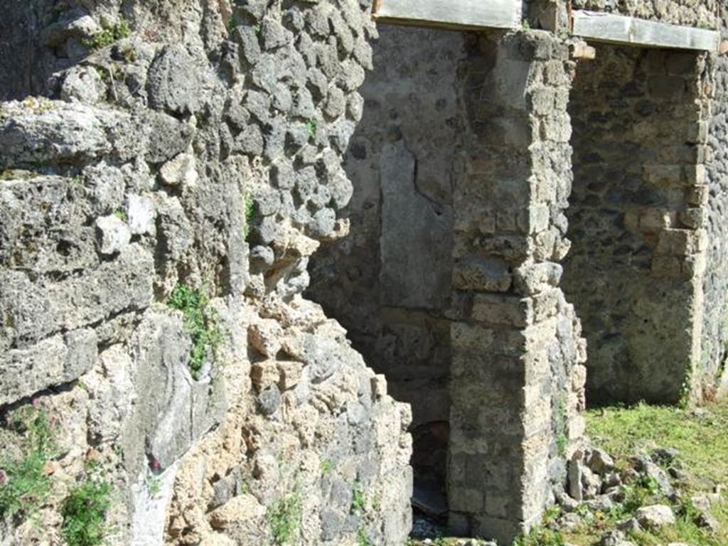 1.3.3 Pompeii.  March 2009. Two doorways to middle rooms in east side of upper level of peristyle area.