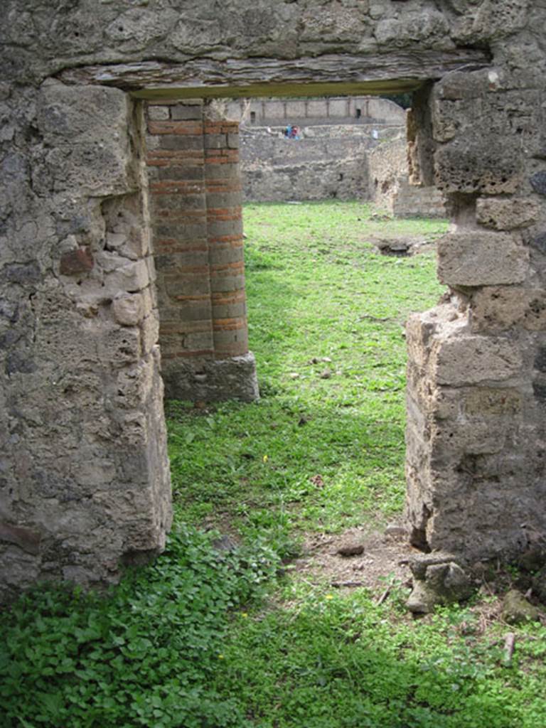 I.3.3 Pompeii. September 2010. Upper peristyle area, looking west through doorway from kitchen. Photo courtesy of Drew Baker.