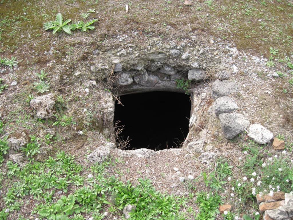 I.3.3 Pompeii. September 2010. Upper peristyle area, detail of light-well hole to lower house. Looking west. Photo courtesy of Drew Baker.