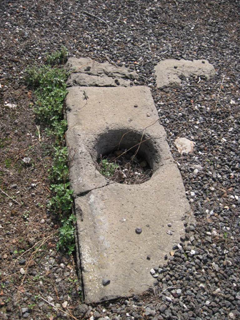 I.3.3 Pompeii. September 2010.  Looking south, showing detail of remains of impluvium cistern hole.  Photo courtesy of Drew Baker.