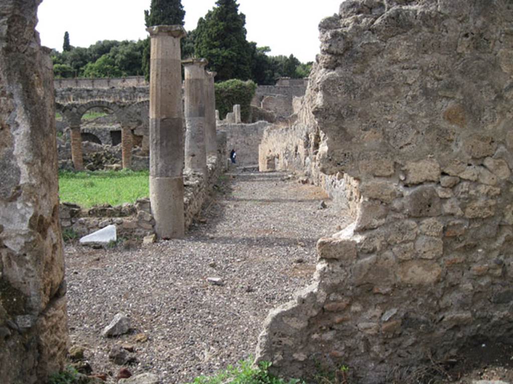 I.3.8b Pompeii. September 2010. Looking towards west wall and doorway to north-east corner of peristyle, from small room. Photo courtesy of Drew Baker.