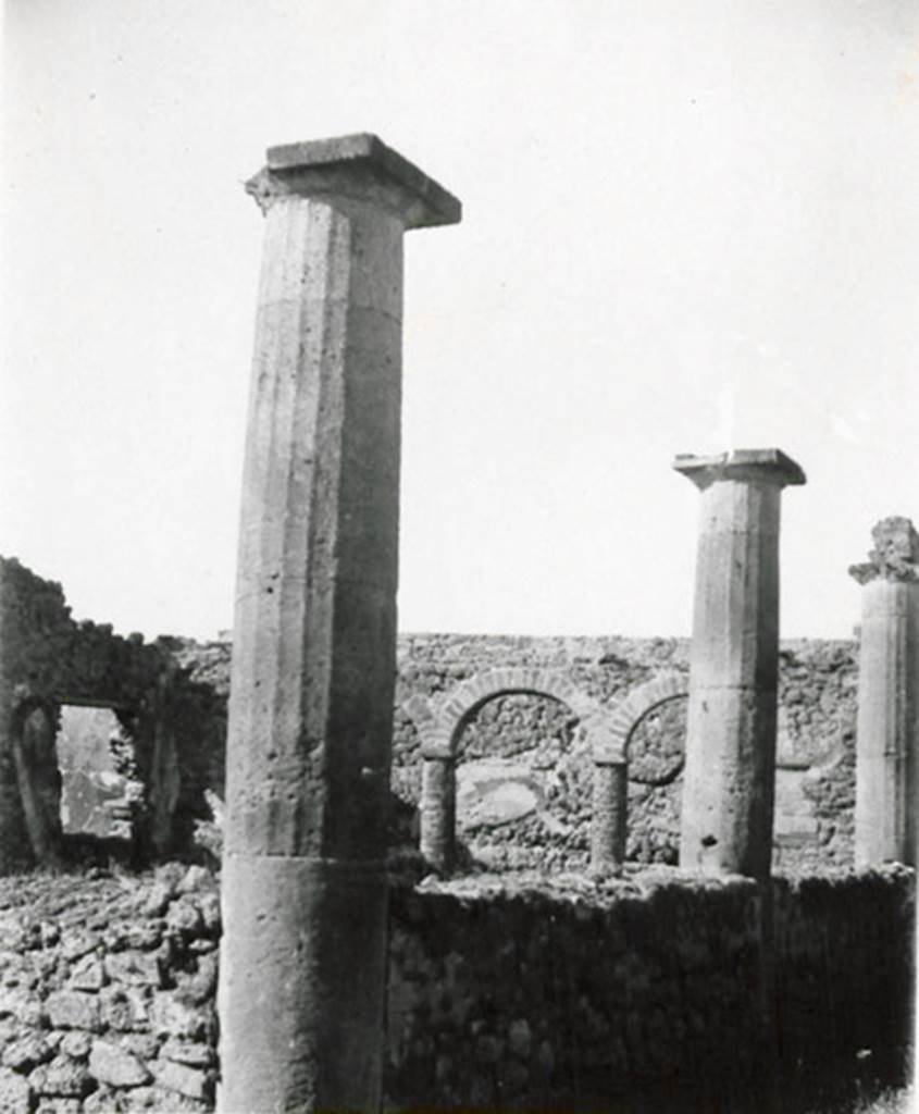 I.3.8b Pompeii. 1935 photograph taken by Tatiana Warscher. Looking west along the north portico, and the arches of the west portico.  
See Warscher, T, 1935: Codex Topographicus Pompejanus, Regio I, 3: (no.20), Rome, DAIR, whose copyright it remains.