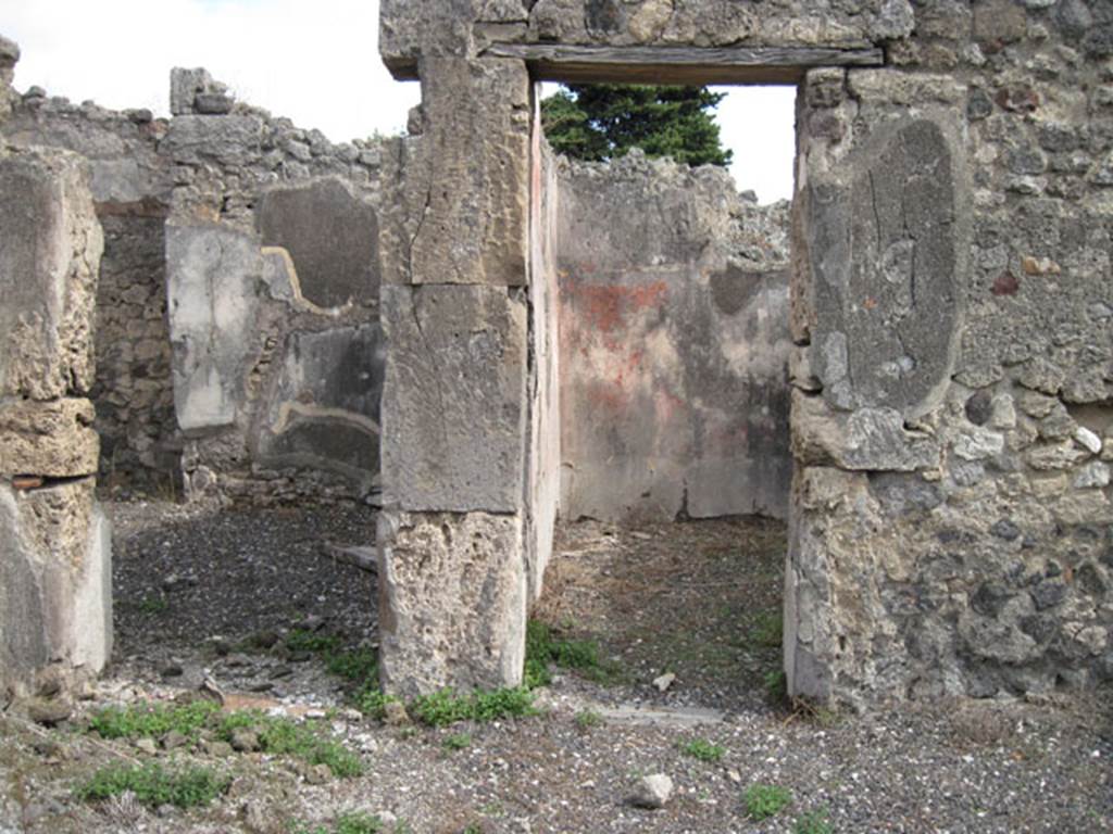 I.3.8b Pompeii. September 2010. East wall of tablinum with two doorways. Photo courtesy of Drew Baker.
