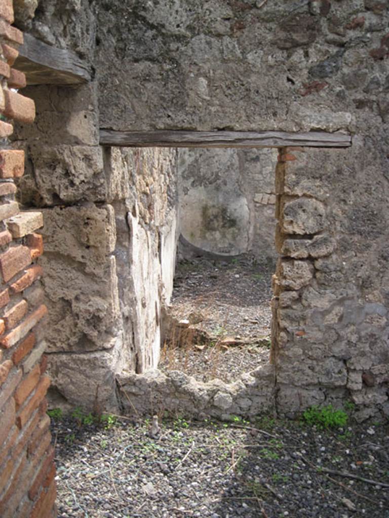 I.3.8b Pompeii. September 2010. Partially blocked doorway, or remains of a window in south wall of corridor. Photo courtesy of Drew Baker.