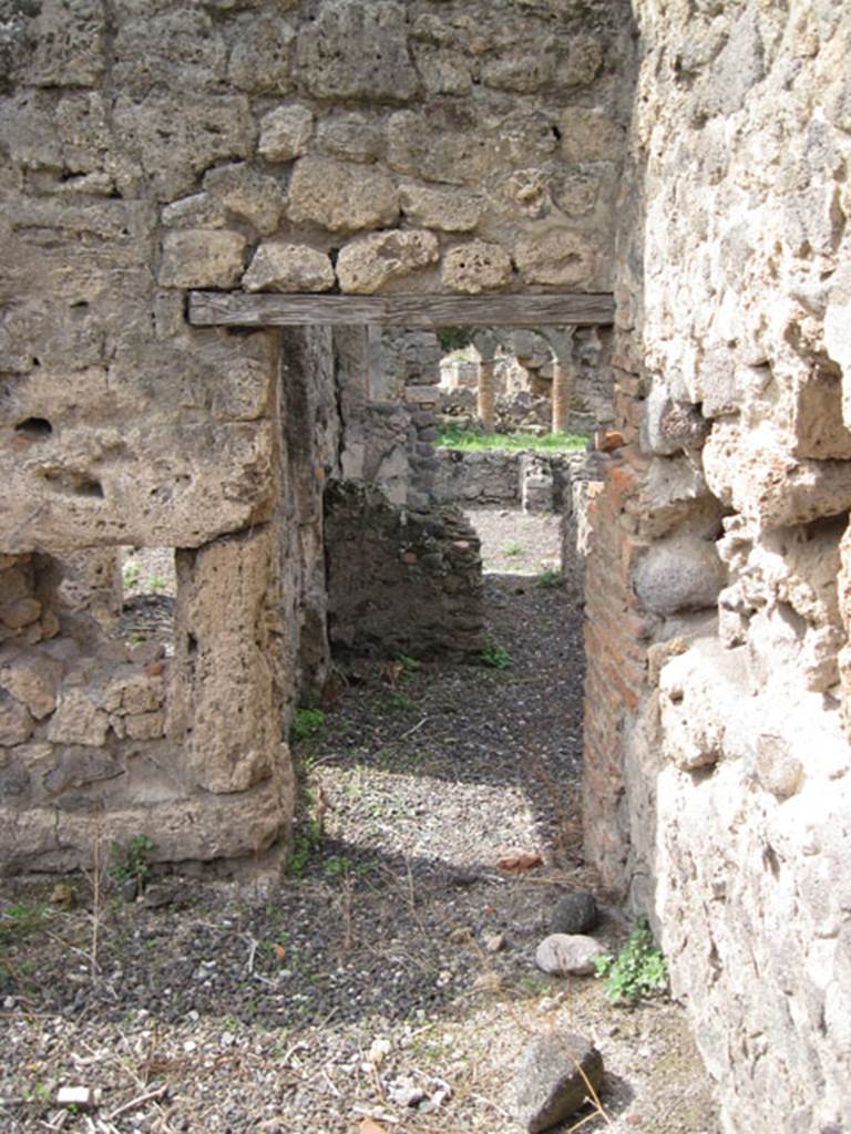 I.3.8b Pompeii. September 2010. Looking west through doorway from kitchen towards corridor. Photo courtesy of Drew Baker.