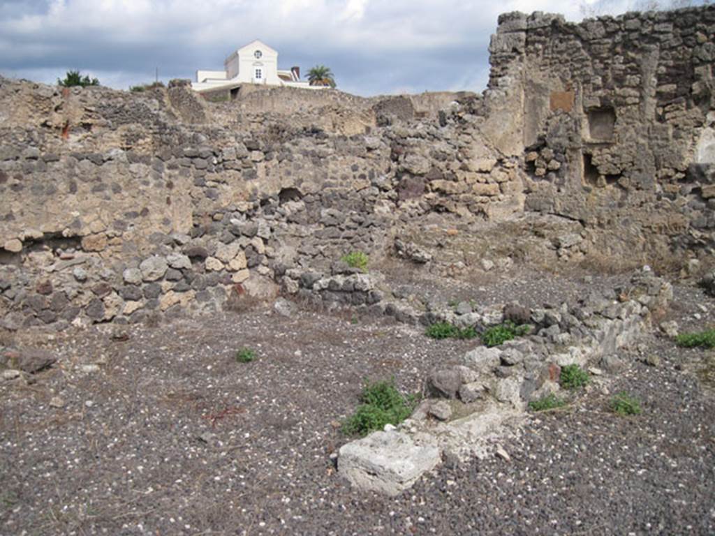 I.3.8a Pompeii. September 2010. Looking across rooms towards north wall and north-east corner near the niche in the east wall. Photo courtesy of Drew Baker.