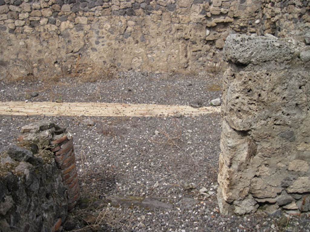 I.3.10 Pompeii. September 2010. Looking north through doorway from eastern room. 
Photo courtesy of Drew Baker.