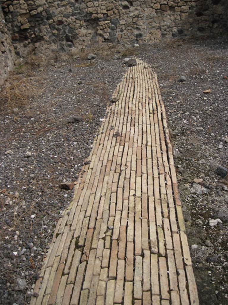 I.3.10 Pompeii. September 2010. Looking east from rear room, along course of Sarno canal. Photo courtesy of Drew Baker.