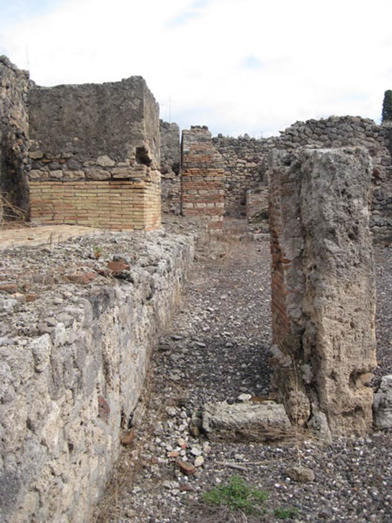 I.3.10 Pompeii. September 2010. Looking east towards doorway of first rear room on the north side of the entrance room. This room was destroyed by the canal works. Photo courtesy of Drew Baker.