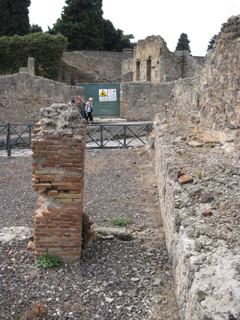 I.3.10 Pompeii. September 2010. Looking west from doorway to small room on north rear side of entrance room. Photo courtesy of Drew Baker.