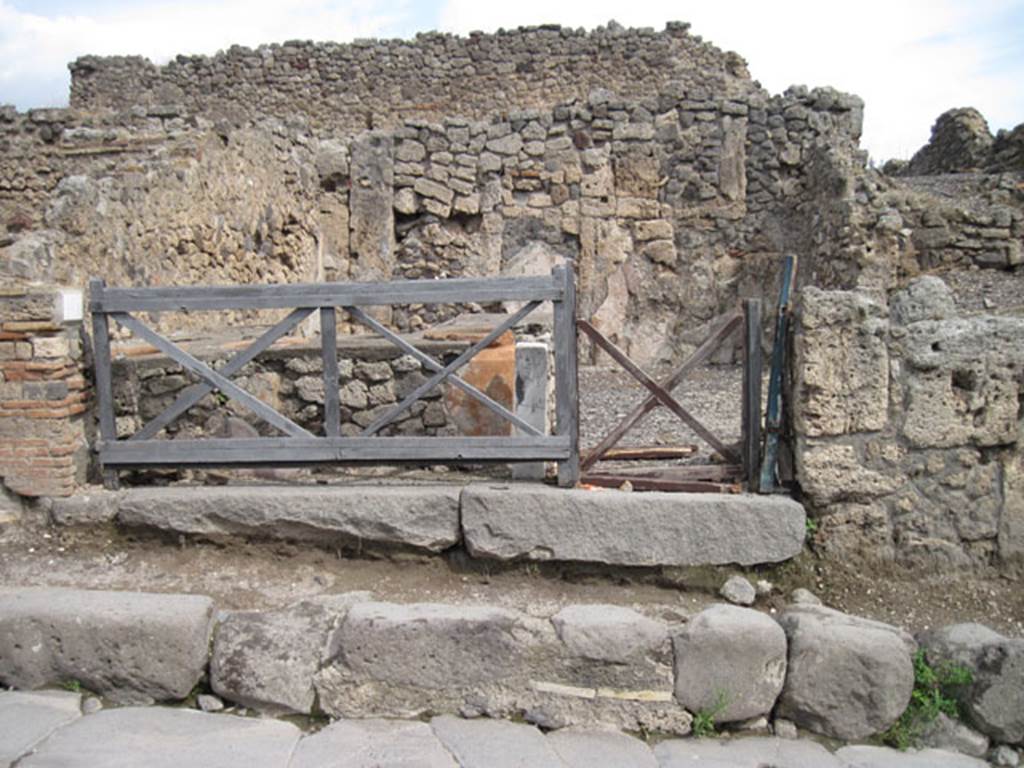 I.3.11 Pompeii. September 2010. Looking east across Via Stabiana towards entrance doorway. Photo courtesy of Drew Baker.