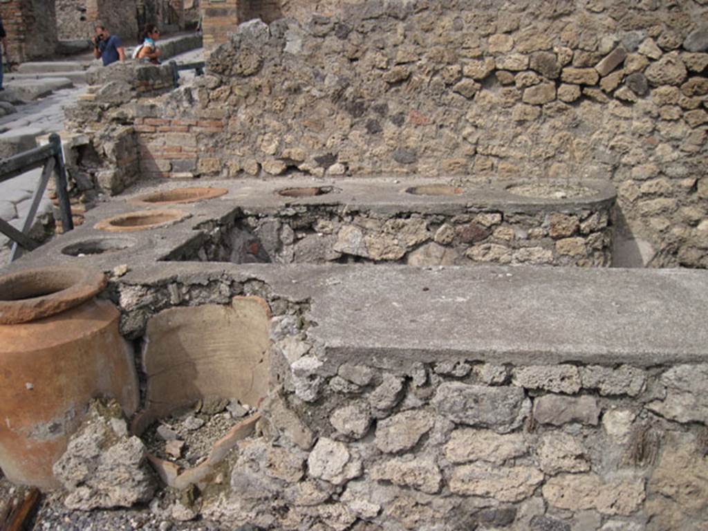 I.3.11 Pompeii. September 2010. Looking north across counter towards north wall and north-west corner. Photo courtesy of Drew Baker.