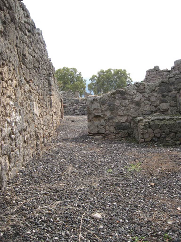 I.3.15 Pompeii. September 2010. Looking south from entrance doorway towards corridor leading to two rear rooms. Photo courtesy of Drew Baker