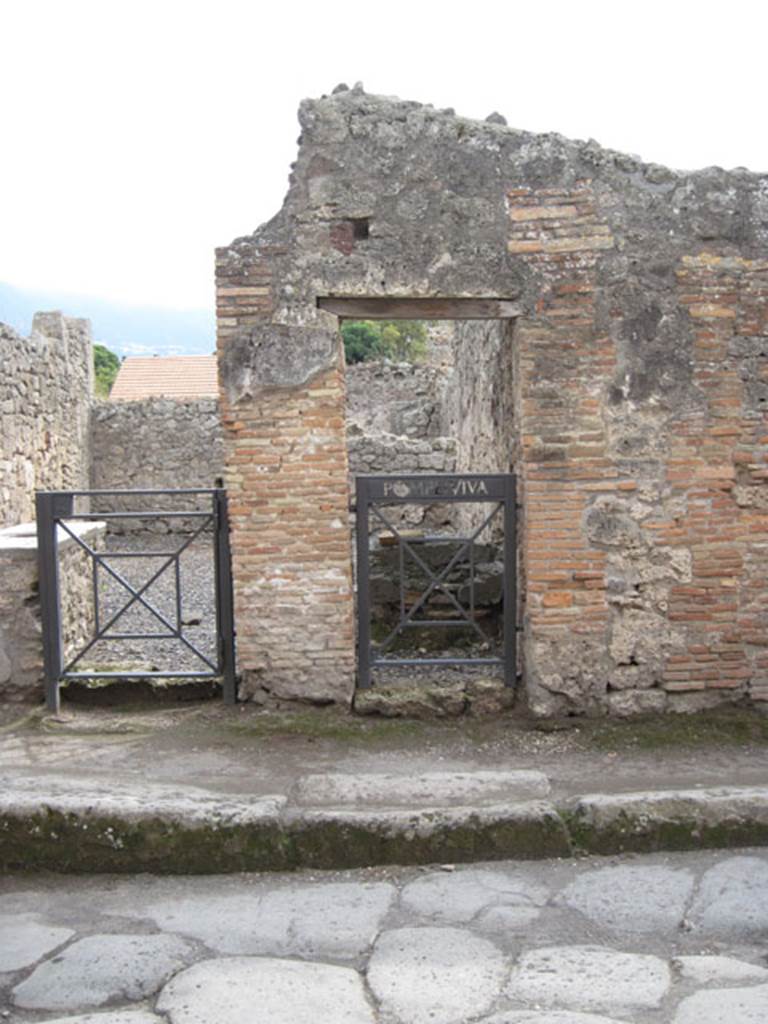 I.3.21 Pompeii. September 2010. Looking south to entrance doorway on Vicolo del Menandro, on right. Photo courtesy of Drew Baker.