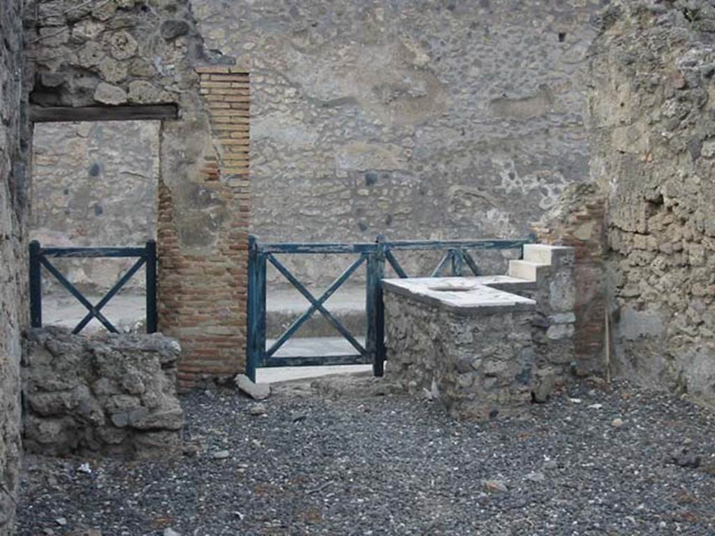 I.3.21 and I.3.22 Pompeii. May 2003. Looking north towards the rear of the entrances.
Photo courtesy of Nicolas Monteix.