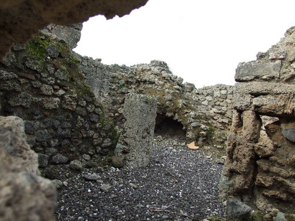 I.3.23 Pompeii. December 2006.  Looking north-west across kitchen towards steps to upper floor, photo taken from I.3.25.
