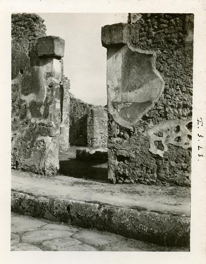 I.3.23 Pompeii. 1935 photograph taken by Tatiana Warscher.
Looking towards entrance doorway, and rooms on the east side of the atrium. 
See Warscher, T, 1935: Codex Topographicus Pompejanus, Regio I, 3: (no.39), Rome, DAIR.  
Photo courtesy of American Academy in Rome, Photographic Archive. Warsher collection no. 003.