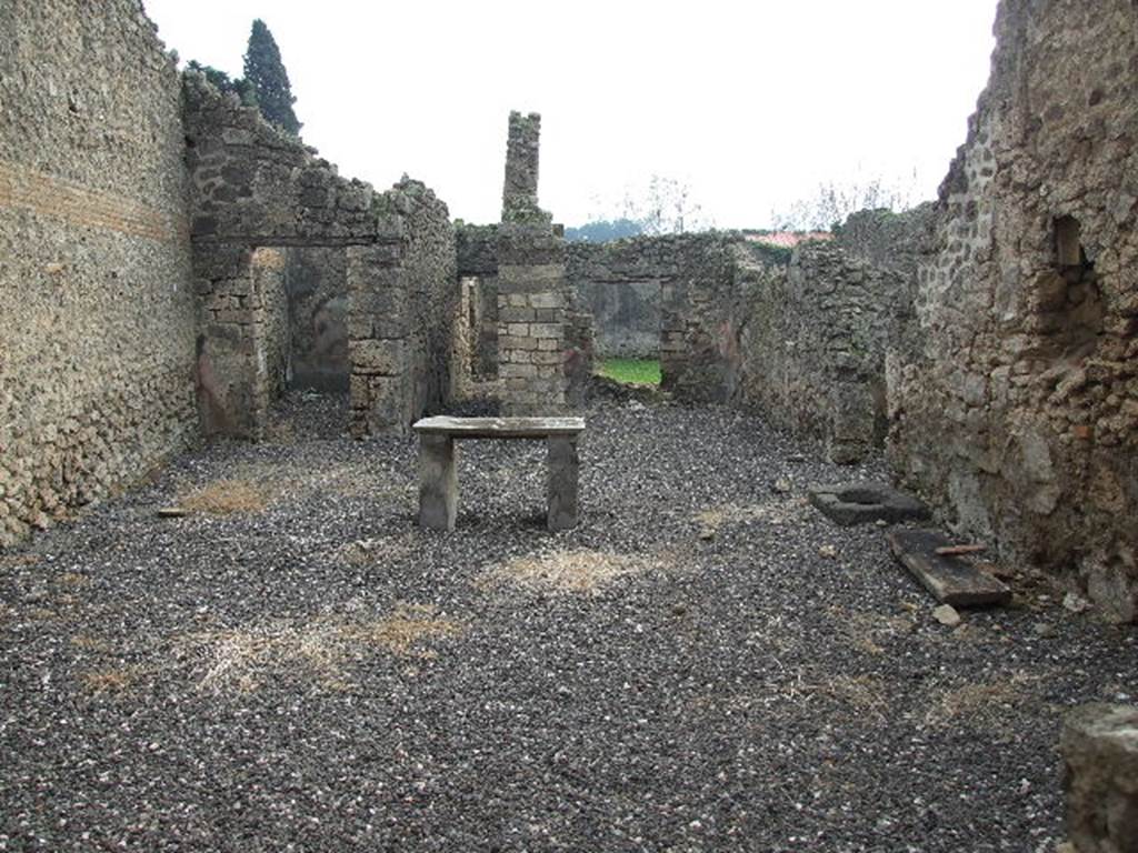 I.3.24 Pompeii. December 2006. Looking south across atrium. On the left is a doorway to the oecus, the corridor leading to the peristyle, the tablinum (centre right). On the right is a doorway into a cubiculum.