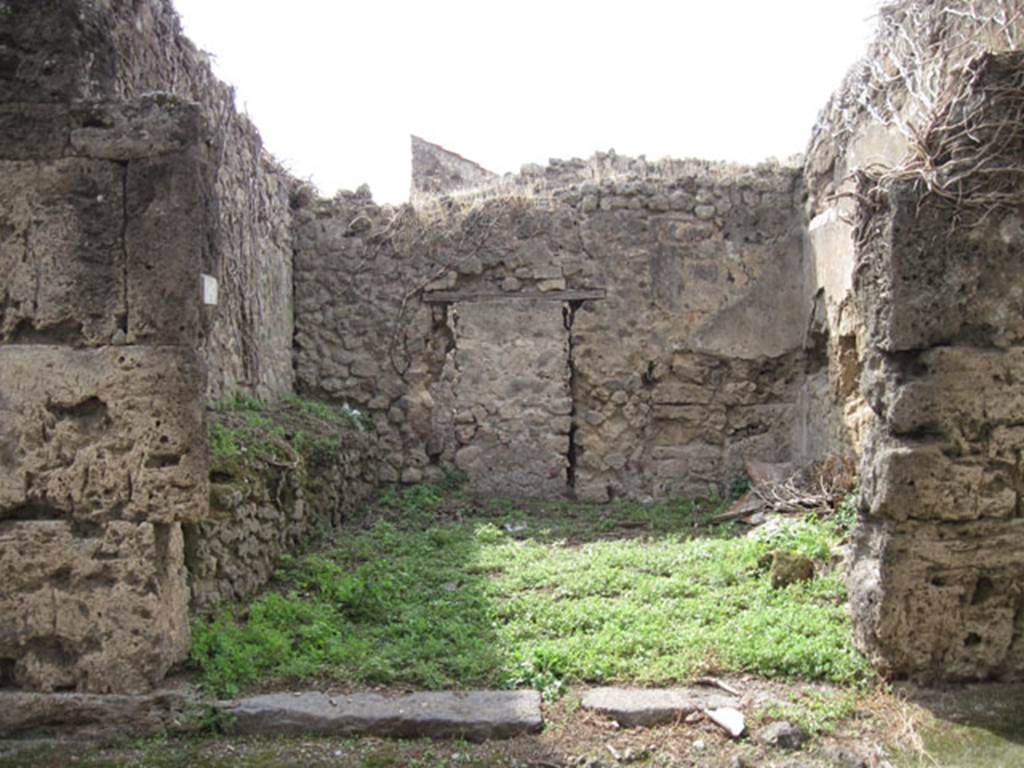 I.3.26 Pompeii. September 2010. Looking west towards entrance from Vicolo del Citarista, (note blocked door). Photo courtesy of Drew Baker. According to Warscher, this was a shop with a high podium against the wall on the left side of the entrance doorway. In the rear wall was a doorway (now blocked) leading to a rear room linked to the atrium of I.3.25.
See Warscher, T, 1935: Codex Topographicus Pompejanus, Regio I, 3: DAI, Rome.