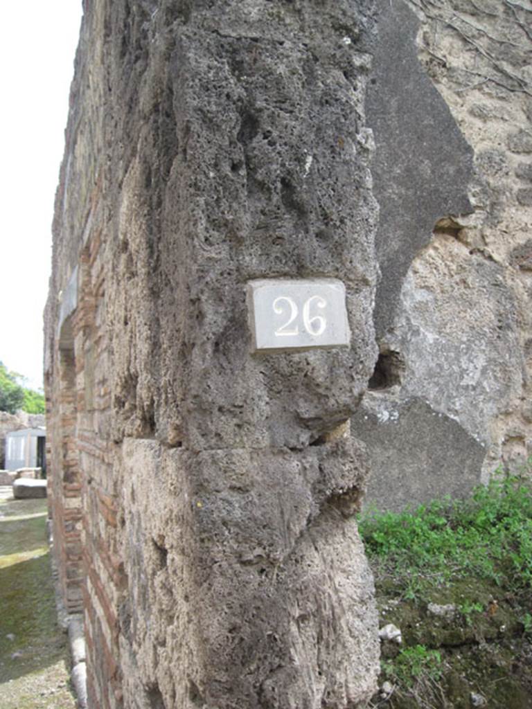 I.3.26 Pompeii. September 2010. ID number plate on south side of entrance doorway. Photo courtesy of Drew Baker.
