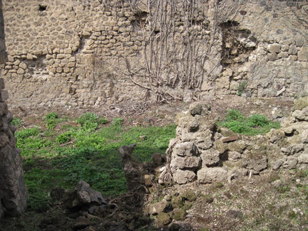I.3.27 Pompeii. September 2010. Looking north from small room, through doorway into bakery room. Photo courtesy of Drew Baker.