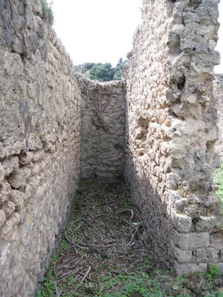 I.3.27 Pompeii. September 2010. Looking west into narrow corridor or stairway, at south end of western side of bakery room. Photo courtesy of Drew Baker.