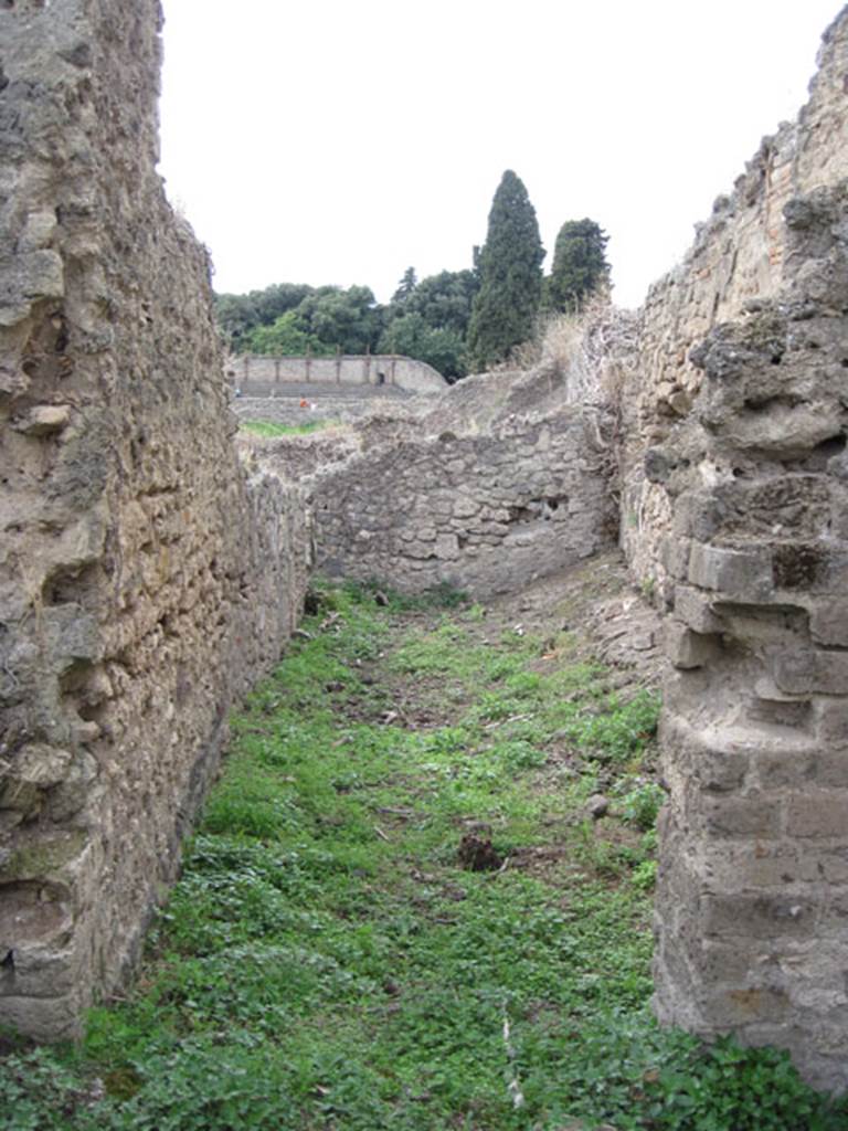 I.3.27 Pompeii. September 2010. Looking west into doorway of room at north end of western side of bakery room. Photo courtesy of Drew Baker.