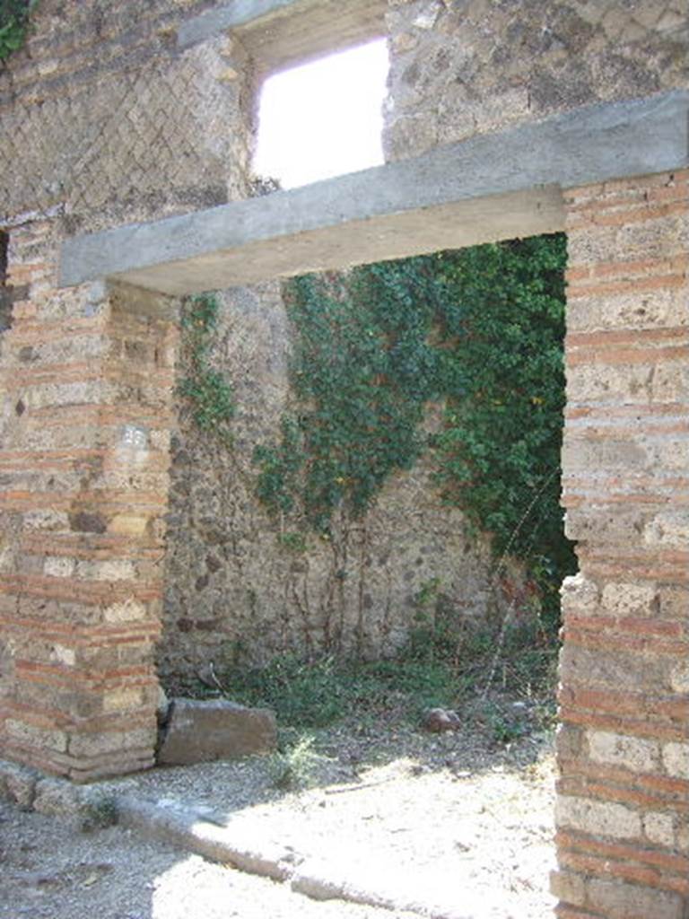 I.3.27 Pompeii. September 2005. Looking south to entrance doorway.